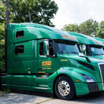 Green Abilene Trucks in the Parking Lot